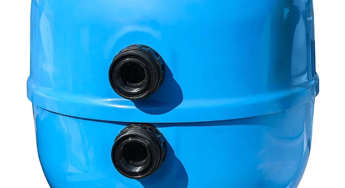 Blue pressure tank with two pipe connections