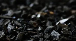 Close-up of dark aquarium gravel substrate