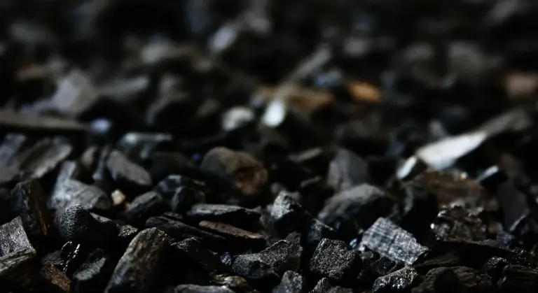 Close-up of dark aquarium gravel substrate