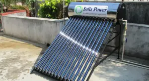 Solar thermal water heater with evacuated glass tubes mounted on a tilted frame, featuring Solis Power branding.